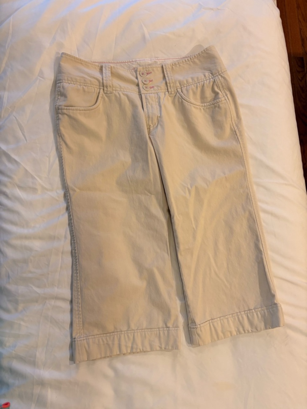 It’s in your genes beige capris with pink stitches